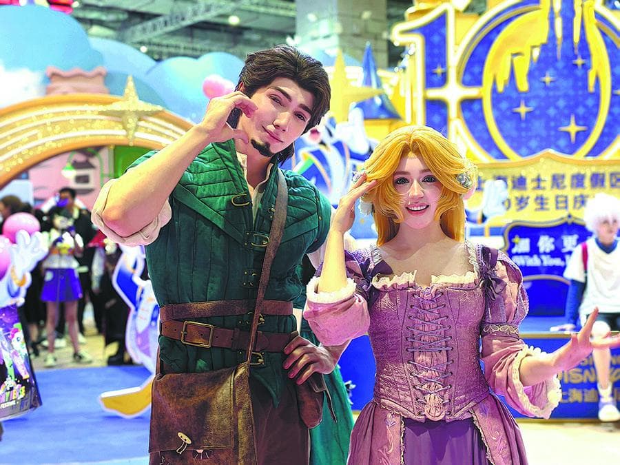 Cosplayers dressed as Disney animated characters at Bilibili World 2026 in Shanghai.